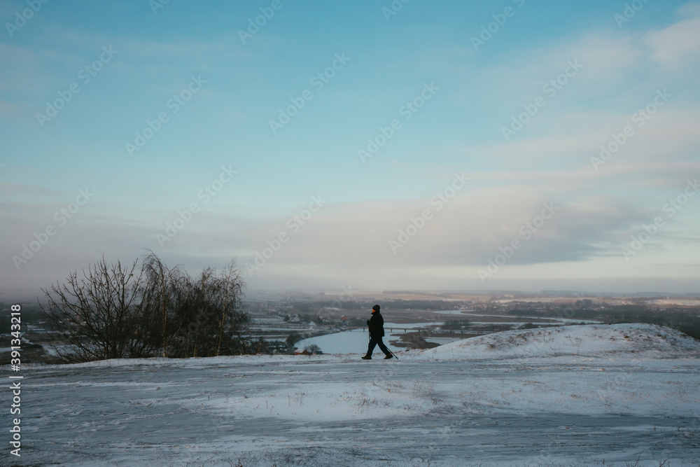 person walking on the snow