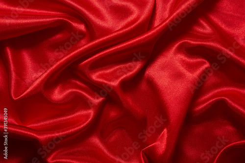 Luxury red satin smooth fabric background for celebration, ceremony, event invitation card or advertising poster