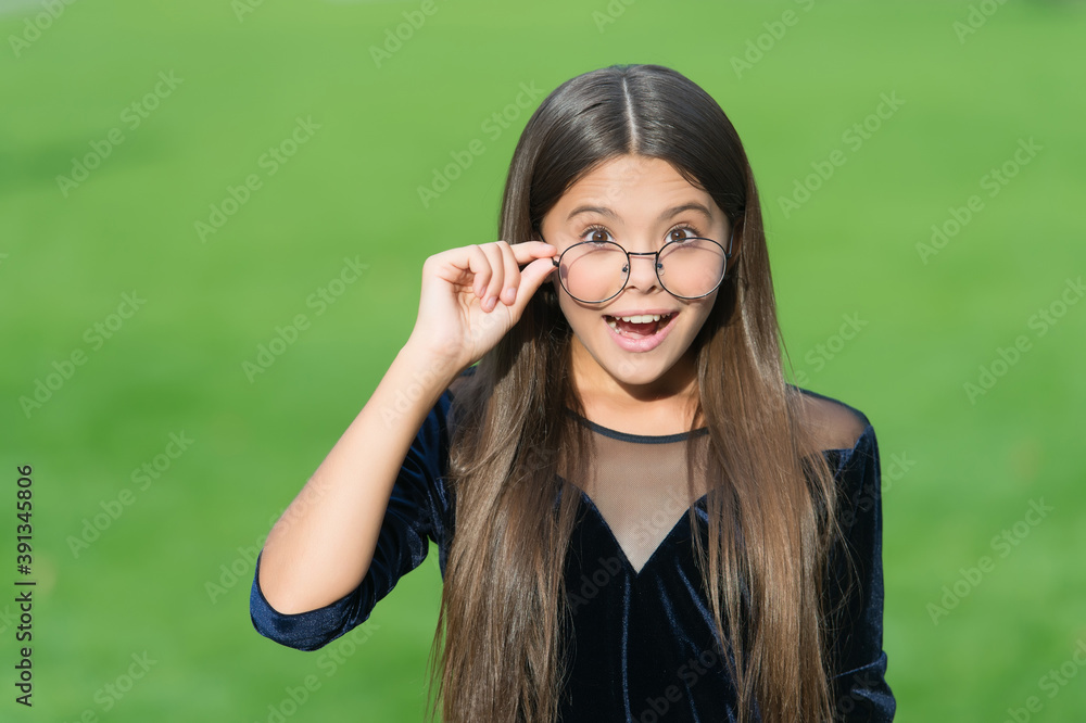 Improved vision is possible. Happy kid fix eyeglasses green grass. Vision correction. Glasses and contacts. Eye test. Pediatric ophthalmology. Optician salon. Fashion eyewear Improved vision is possible. Happy kid fix eyeglasses green grass. Vision correction. Glasses and contacts. Eye test. Pediatric ophthalmology. Optician salon. Fashion eyewear