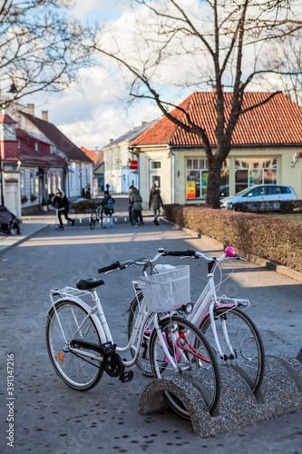 Bicycle parking station with bikes is in center of the Kuressaare town at winter season, Estonia