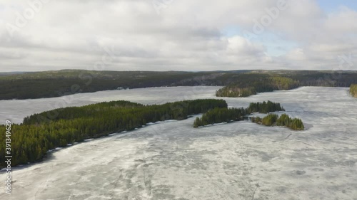 Frozen Lake Thawing Out After Winter Freeze in Northwestern Ontario photo