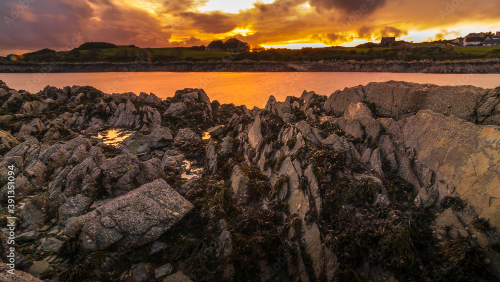 Isle of Whithorn harbour set in a dramatic sunset