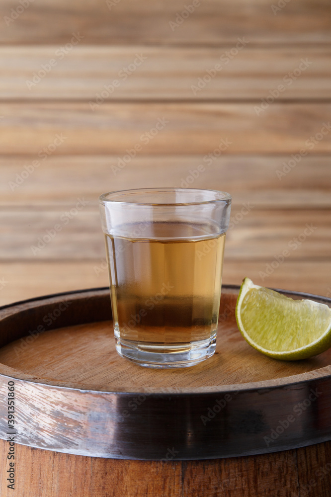 Cup of Cachaça or Pinga, a traditional Brazilian drink made from sugar cane. Cup of Cachaça or Pinga, a traditional Brazilian drink made from sugar cane.