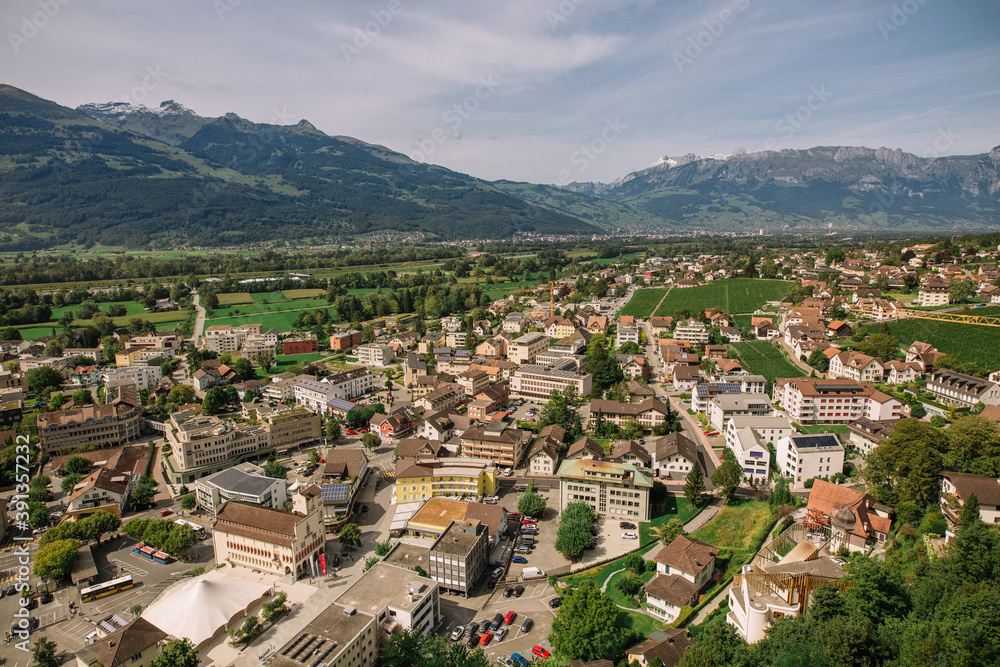 Scenic aerial view of the village in Triesenberg , natural border of Liechtenstein, an alpine country in central Europe, to Switzerland. Panoramic Liechtenstein. Aerial view of vaduz. RAW