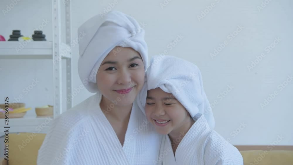 Spa concept. Asian mothers and daughters happy in facial care. 4k Resolution. Spa concept. Asian mothers and daughters happy in facial care. 4k Resolution.