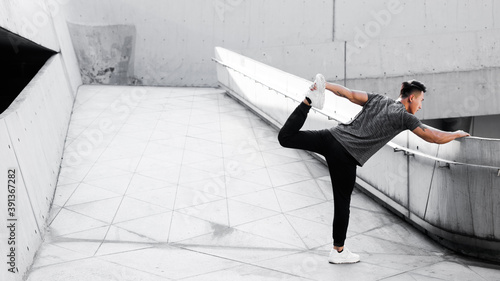 A Chinese man is exercising in the city