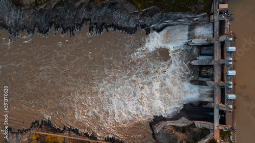 Hydroelectric dam on river photo