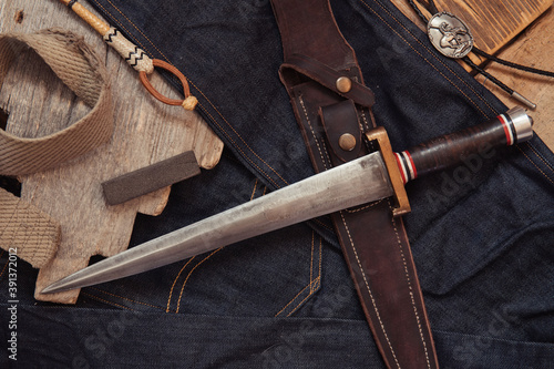 Arkansas toothpick. Large vintage dagger still life.