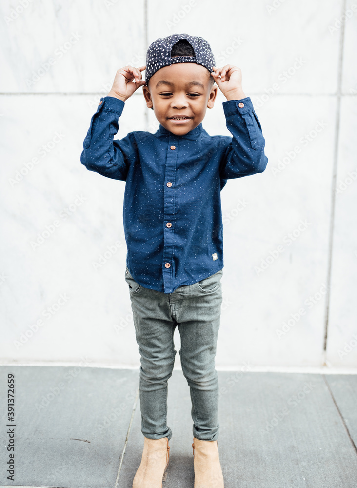 Little Boy walking in shopping center Little Boy walking in shopping center
