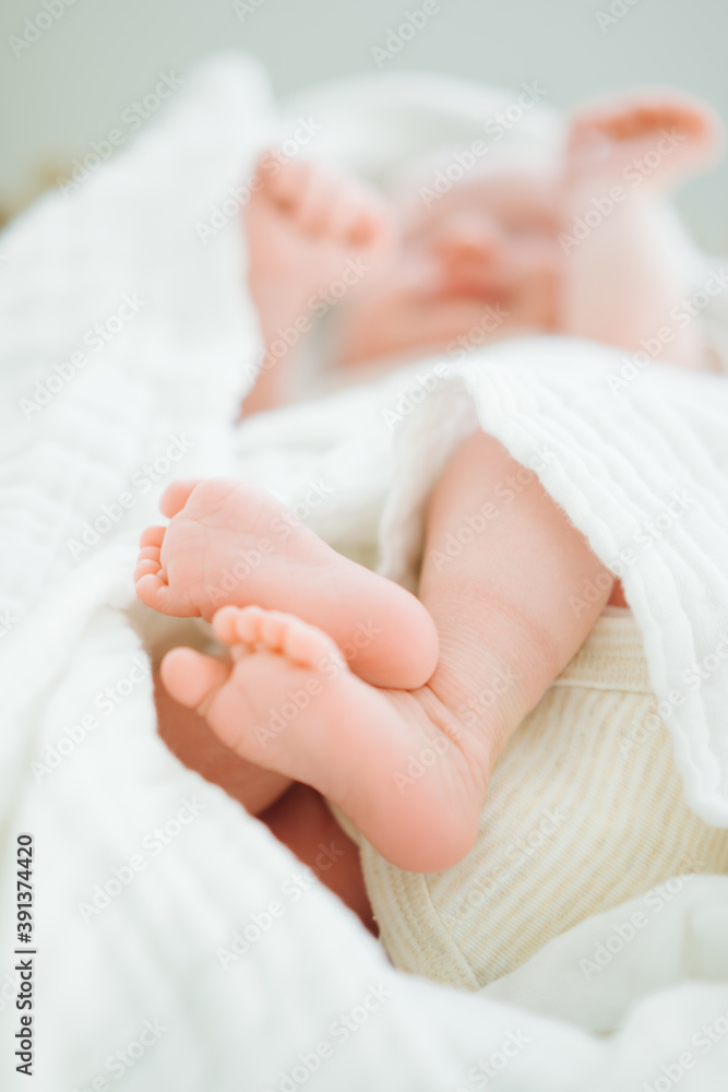 Cute sleeping newborn baby on white blanket Cute sleeping newborn baby on white blanket