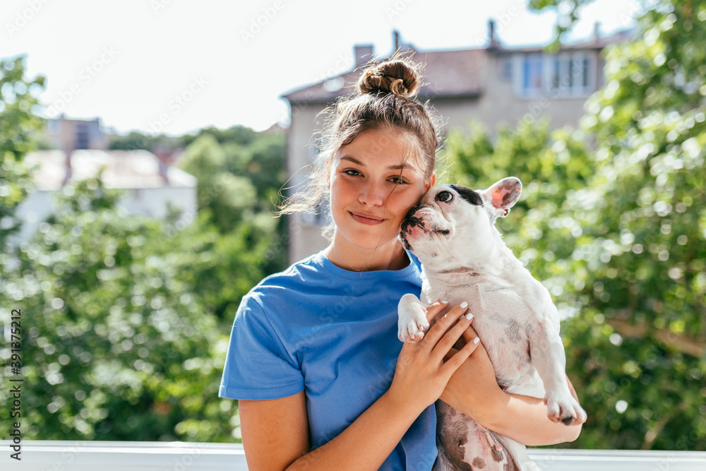 Woman Cuddling With Frenchie Woman Cuddling With Frenchie