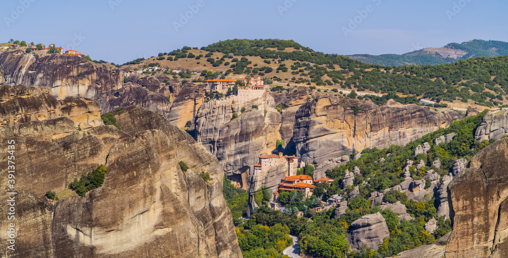 Beautiful panorama of landscapes with monasteries (Varlaam, Rousanou, and Great Meteoron) and spectacular rock formations in Meteora, Greece