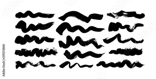 Black paint wavy brush strokes vector collection. Dirty curved lines and wavy brushstrokes. Ink illustration isolated on white background. Modern grunge brush lines. Calligraphy smears  stamps.
