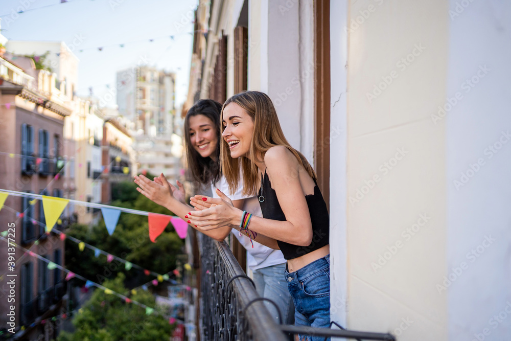 Two Girls Applauding From Home.