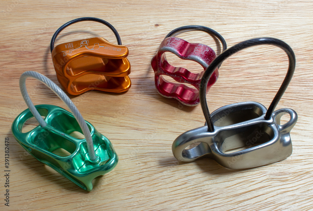 Guide Mode Four belay devices, two of them with guide mode function Stock Photo ...