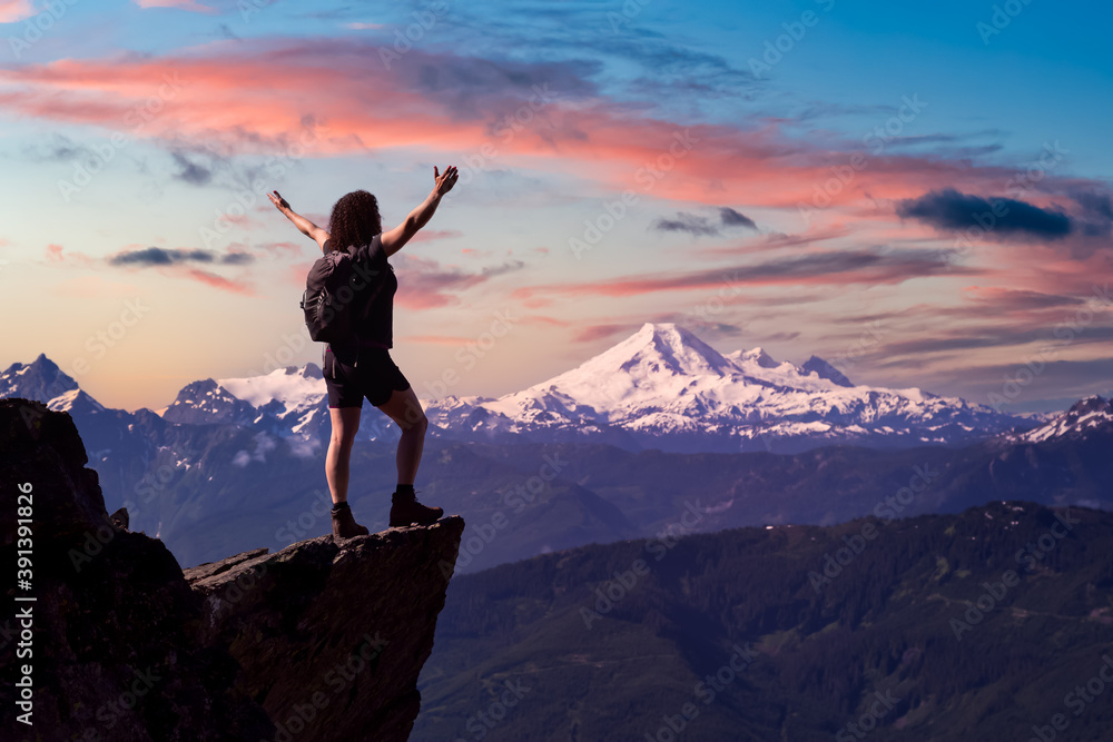 Adventurous Person Hiking in the Canadian Mountains. Colorful Sunrise Sky Art Render. Taken on the Trail to Cheam Peak in Chilliwack, East of Vancouver, British Columbia, Canada.