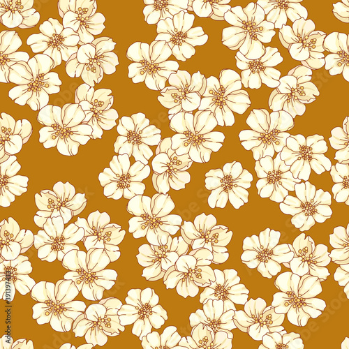 Seamless pattern of pear flowers on a golden ocher background. Design of wrapping paper, printed fabric, napkins.