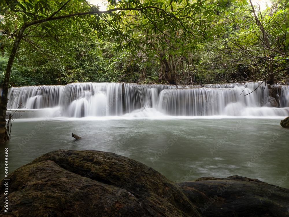 Fototapeta premium Beautyful waterfall in the forest at Kanchanaburi Thailand 