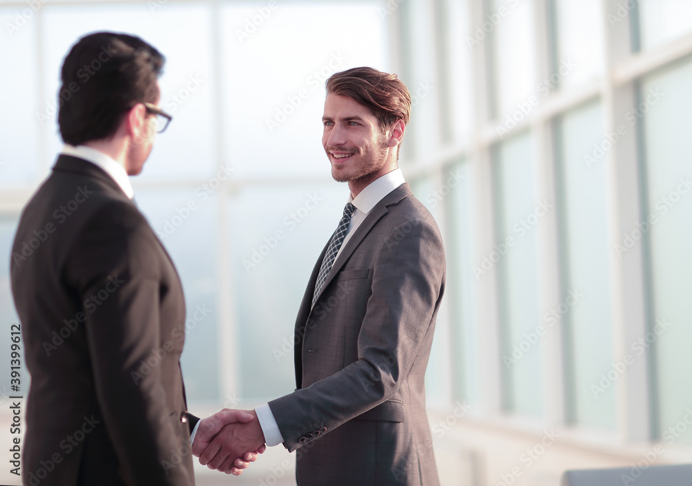 friendly handshake of business partners friendly handshake of business partners