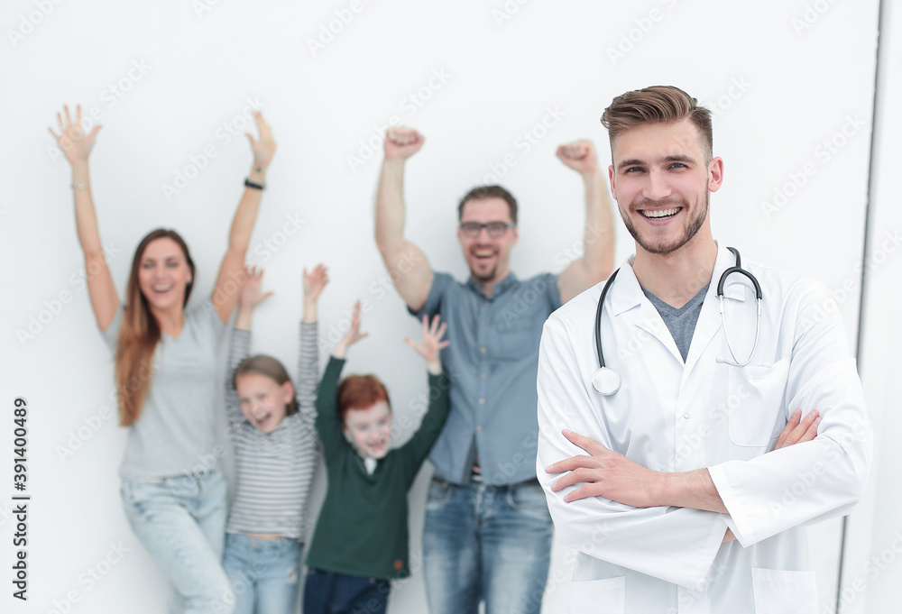 portrait of a family doctor on the background of his happy patients portrait of a family doctor on the background of his happy patients