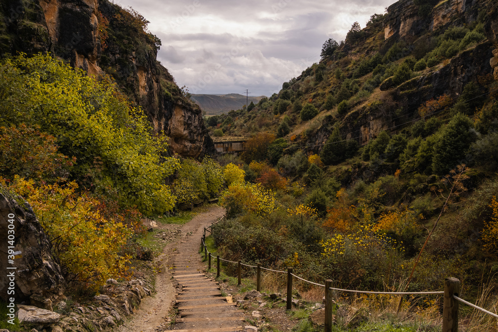 Natural canyon between the Villages Patones de Arriba and Patones de Abajo in autumn. Madrid, Spain