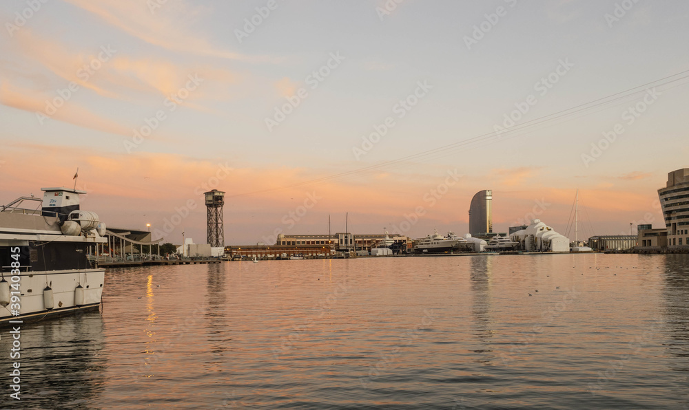 Spectacular sunset in the city of Barcelona. Barcelona skyline, port of Barcelona