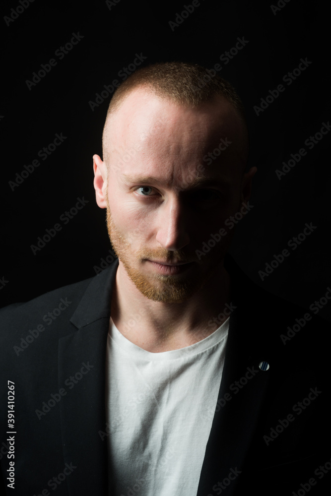 Portrait of stylish handsome young man. Fashion guy on black. Portrait of stylish handsome young man. Fashion guy on black.