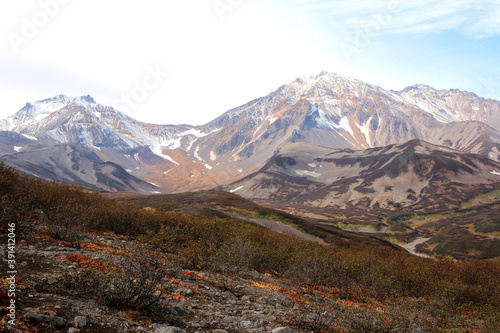 Autumn tundra and Kamchatka mountains. A place that can only be hiked over the passes