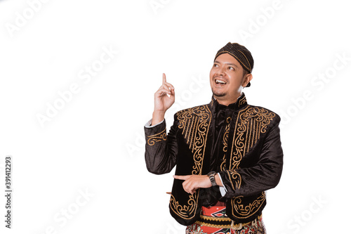 A portrait of a costume traditional Javanese man. Showing copy space isolated on white background photo