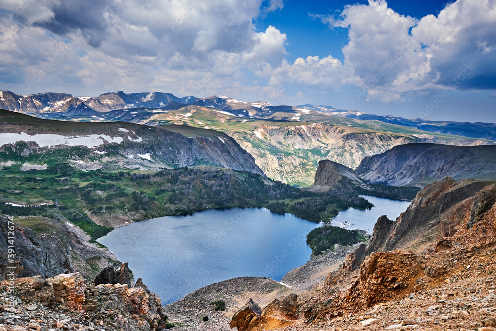 Twin Lakes - Snow even in August around alpine lakes near the Beartooth Pass, Wyoming.