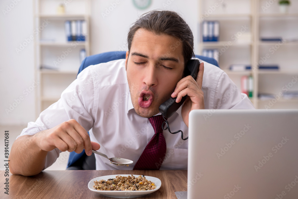 Young businessman working in the office