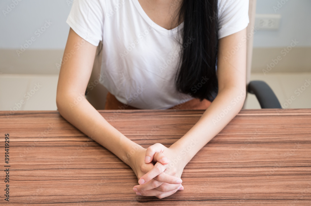 Close up woman hand on wooden table background. Close up woman hand on wooden table background.