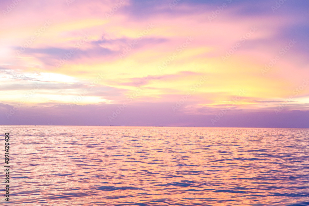 Pastel Sunset sky. Natural color over the sea.