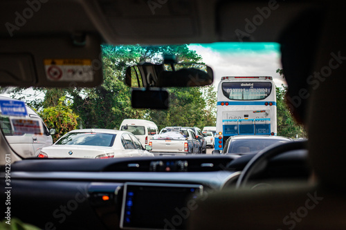 Nakhon Sawan, Thailand, Apr 12, 2019 - Traffic jam on the road during long holiday from inside car view