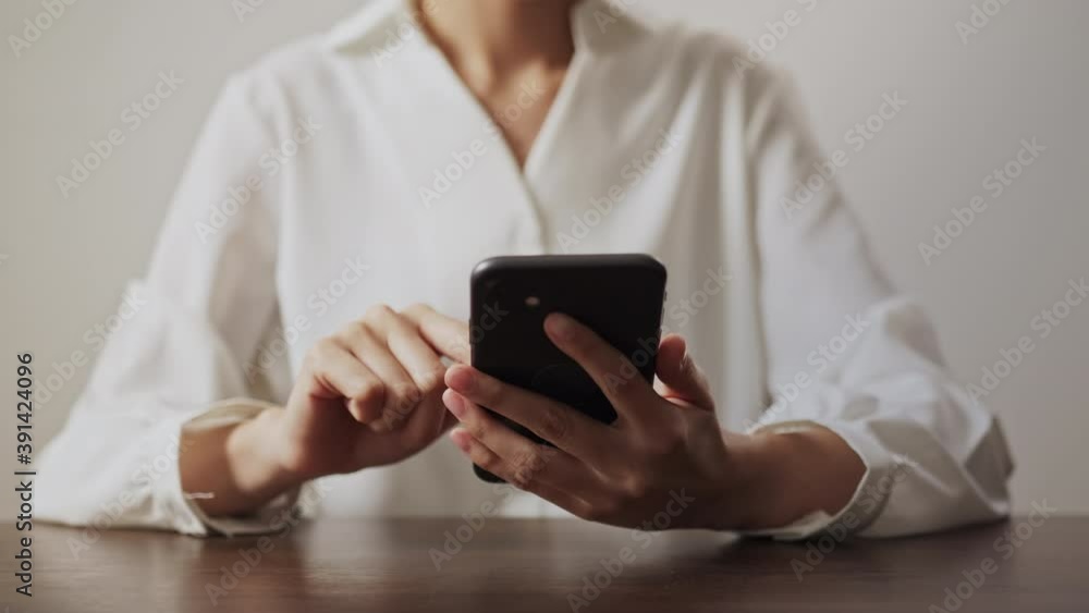 Woman using smartphone, During leisure time. The concept of using the phone is essential in everyday life. Woman using smartphone, During leisure time. The concept of using the phone is essential in everyday life.