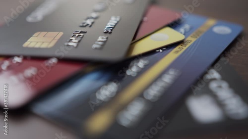 credit bank cards stack on the table.