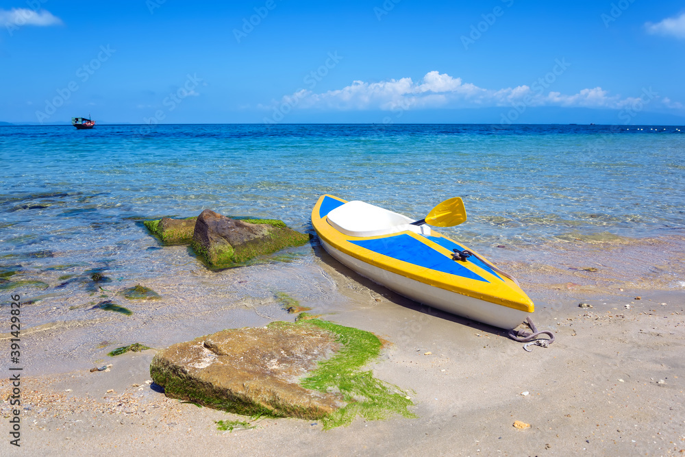 Kayak is anchoring on the beach in Phu Quoc island, Kien Giang province, Vietnam.