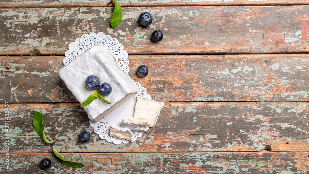 goat cheeses crottin de chavignol. Soft french cheese with ash, goat