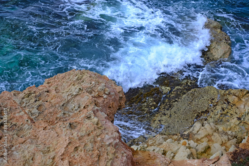 oncoming waves on the coral coast of Cyprus