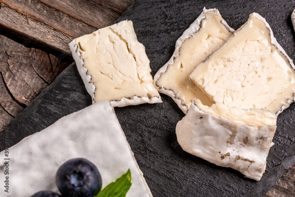 goat cheeses crottin de chavignol. Soft french cheese with ash, goat