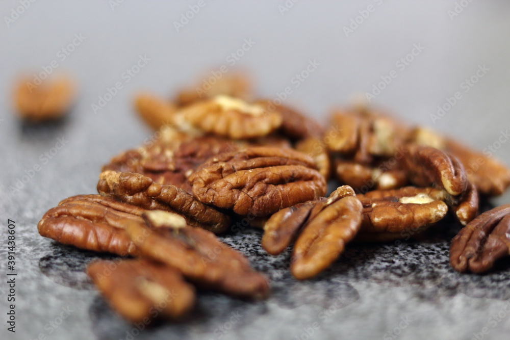 Pecan Nut Halves on Granite Slab Pecan Nut Halves on Granite Slab
