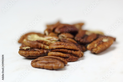 Pecan Nut Halves. Isolated on white background.