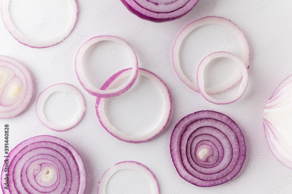 Red onion Sliced in different ways and arranging. Top view Garnish and food ingredients on isolated white background. Red onion Sliced in different ways and arranging. Top view Garnish and food ingredients on isolated white background.