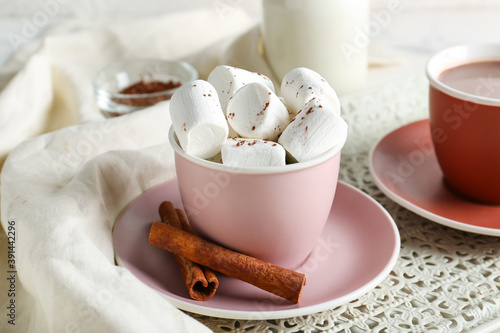 Cup of hot cacao drink with...