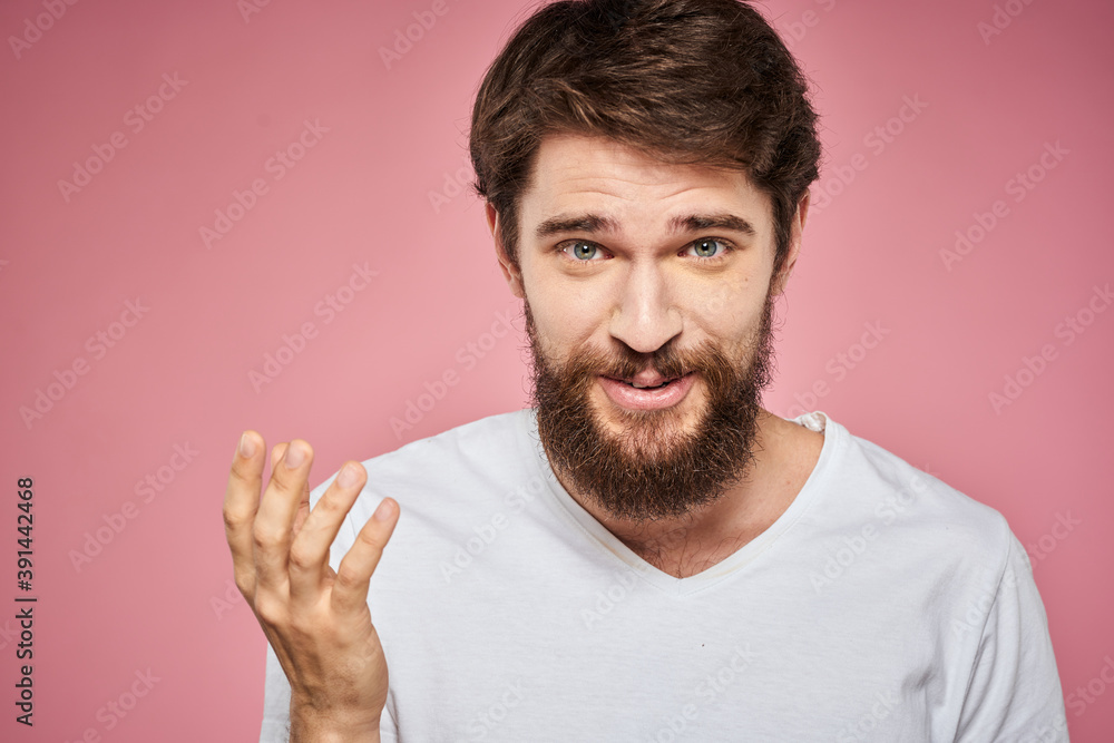 man in white t-shirt gesturing with his hands emotions fun pink background man in white t-shirt gesturing with his hands emotions fun pink background