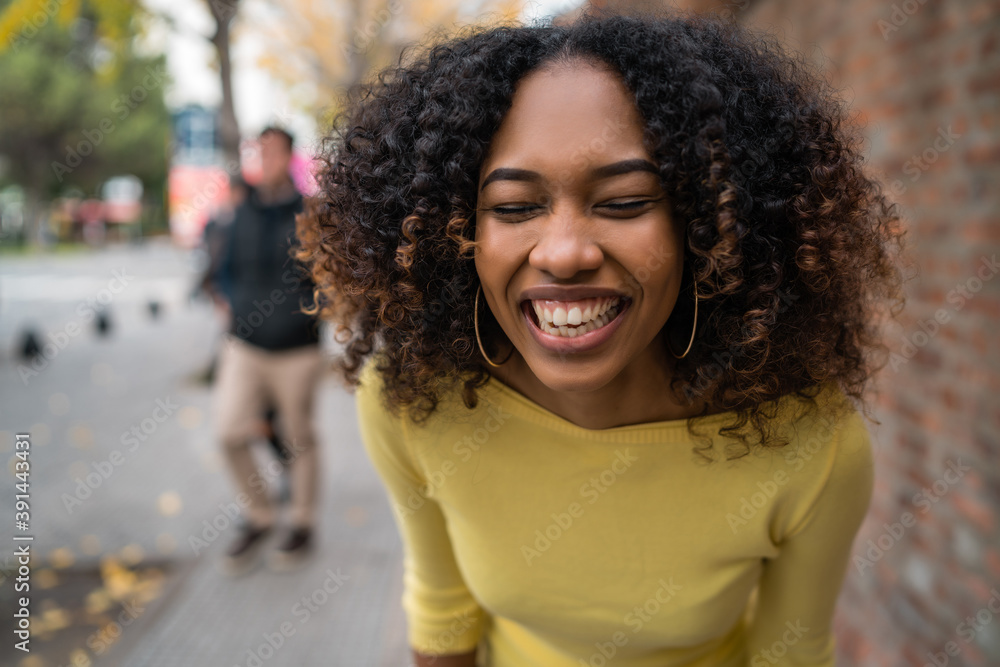 Portrait of Afro-american woman laughing. Portrait of Afro-american woman laughing.