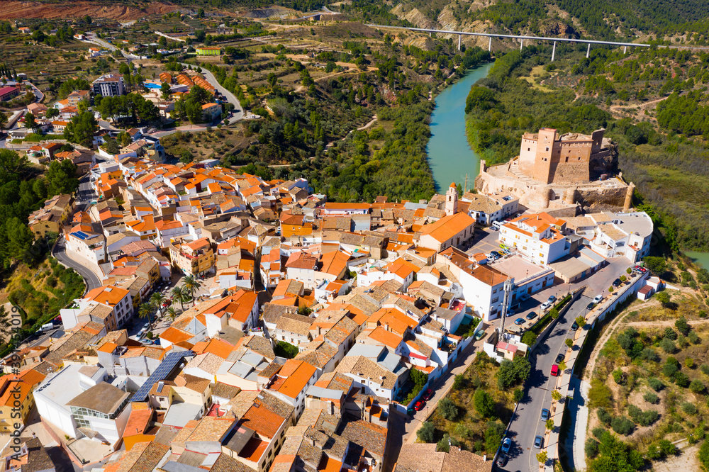 Top view of the city of Cofrentes and the medieval castle by the river. Spain