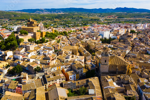 Scenic aerial view of Spanish city of Caravaca de la Cruz with old Castle and Basilica of Vera Cruz