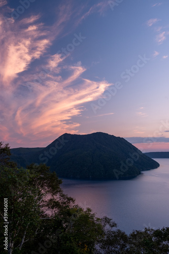 Fototapeta Naklejka Na Ścianę i Meble -  Lake Mashu at dusk with colorful clouds