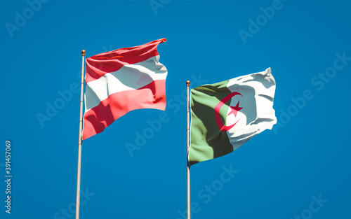 Beautiful national state flags of Algeria and Austria together at the sky background. 3D artwork concept.